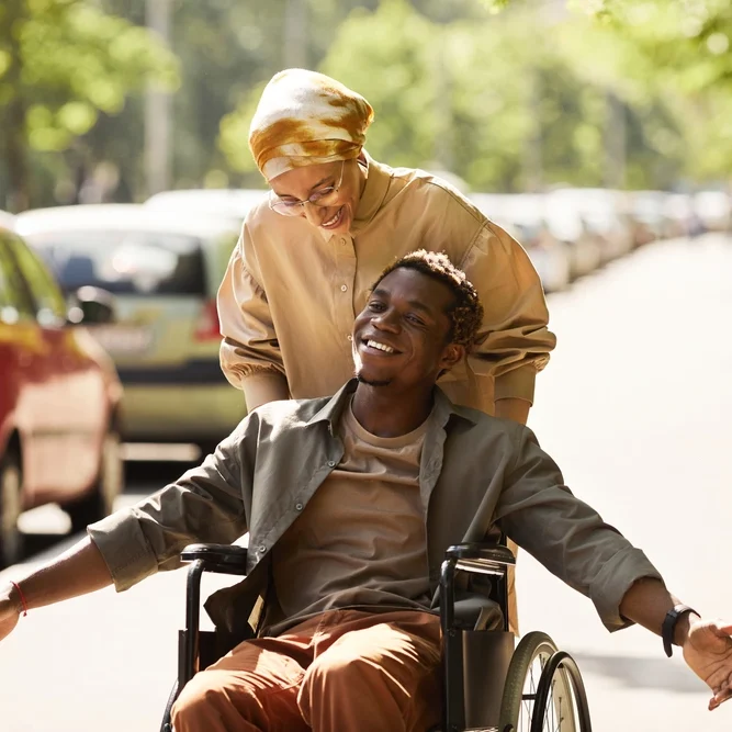 disabled men hanging out with a friend