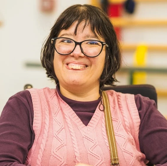 Disabled women with down syndrome smiling